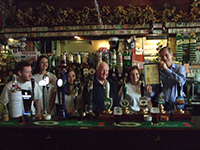 Les Maggs and Staff of the Cleveland Arms behind the bar receiving their certificate